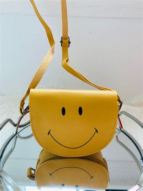 smiley face handbag.